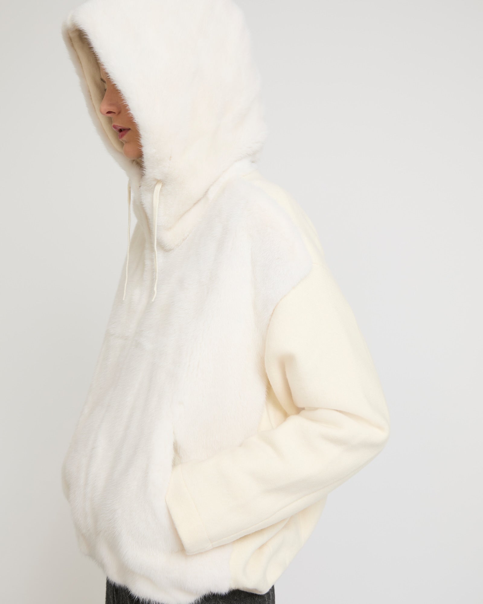 Belted down jacket in waterproof technical fabric with fox and