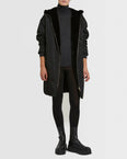 Long reversible coat in technical fabric and mink fur