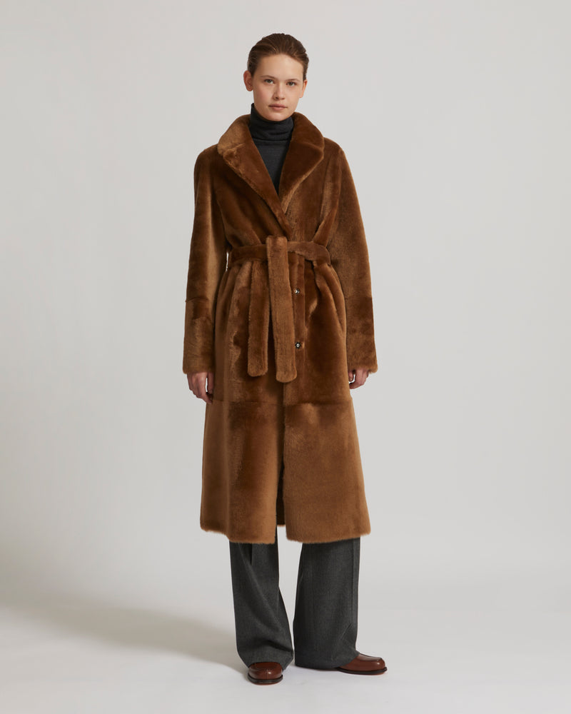 Long reversible belted shearling coat
