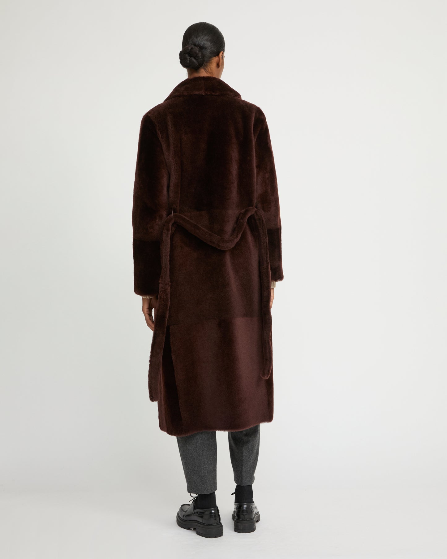 Long reversible belted shearling coat