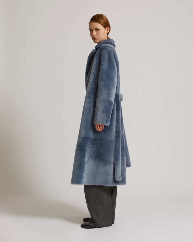 Long reversible belted shearling coat