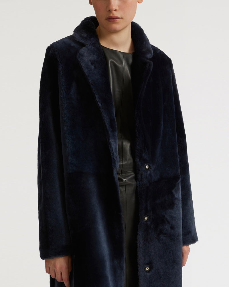 Reversible merino shearling coat