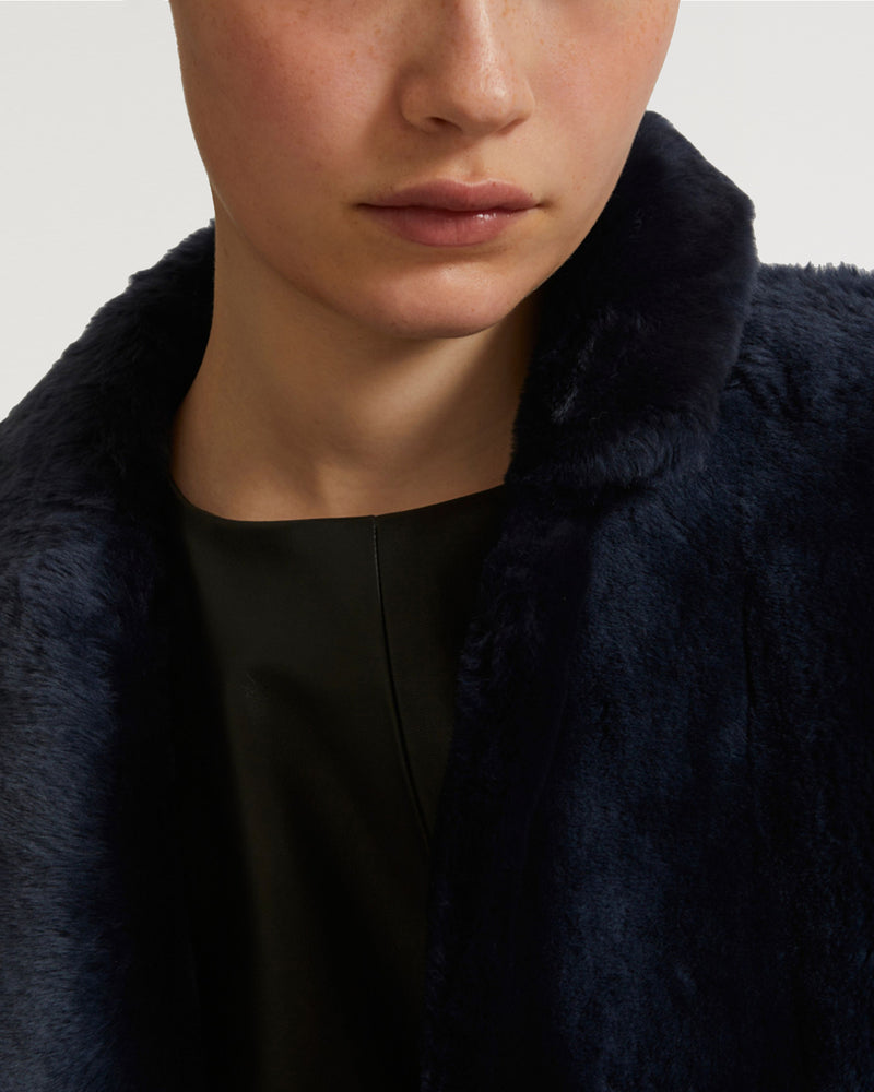 Reversible merino shearling coat