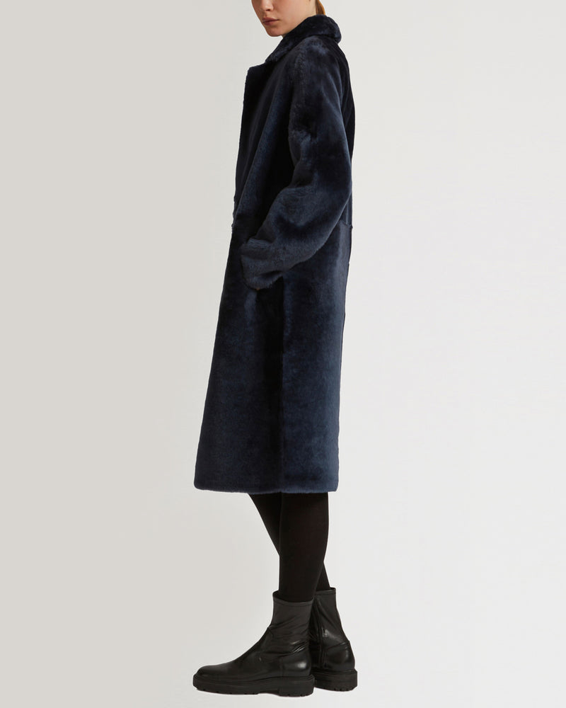 Reversible merino shearling coat