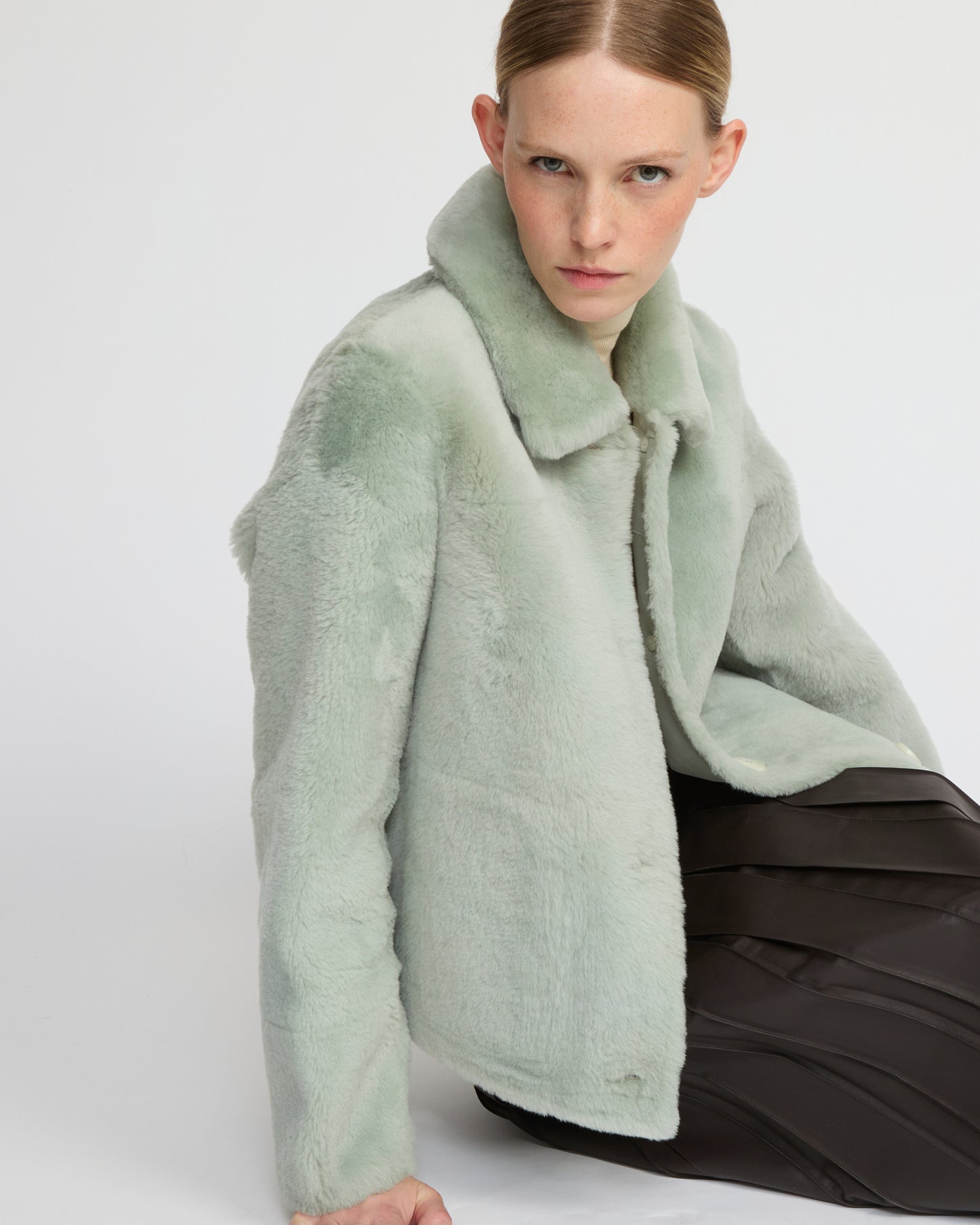 Short reversible jacket in merino lambskin