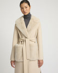 Belted coat in cashmere wool with mink fur collar and over-pockets