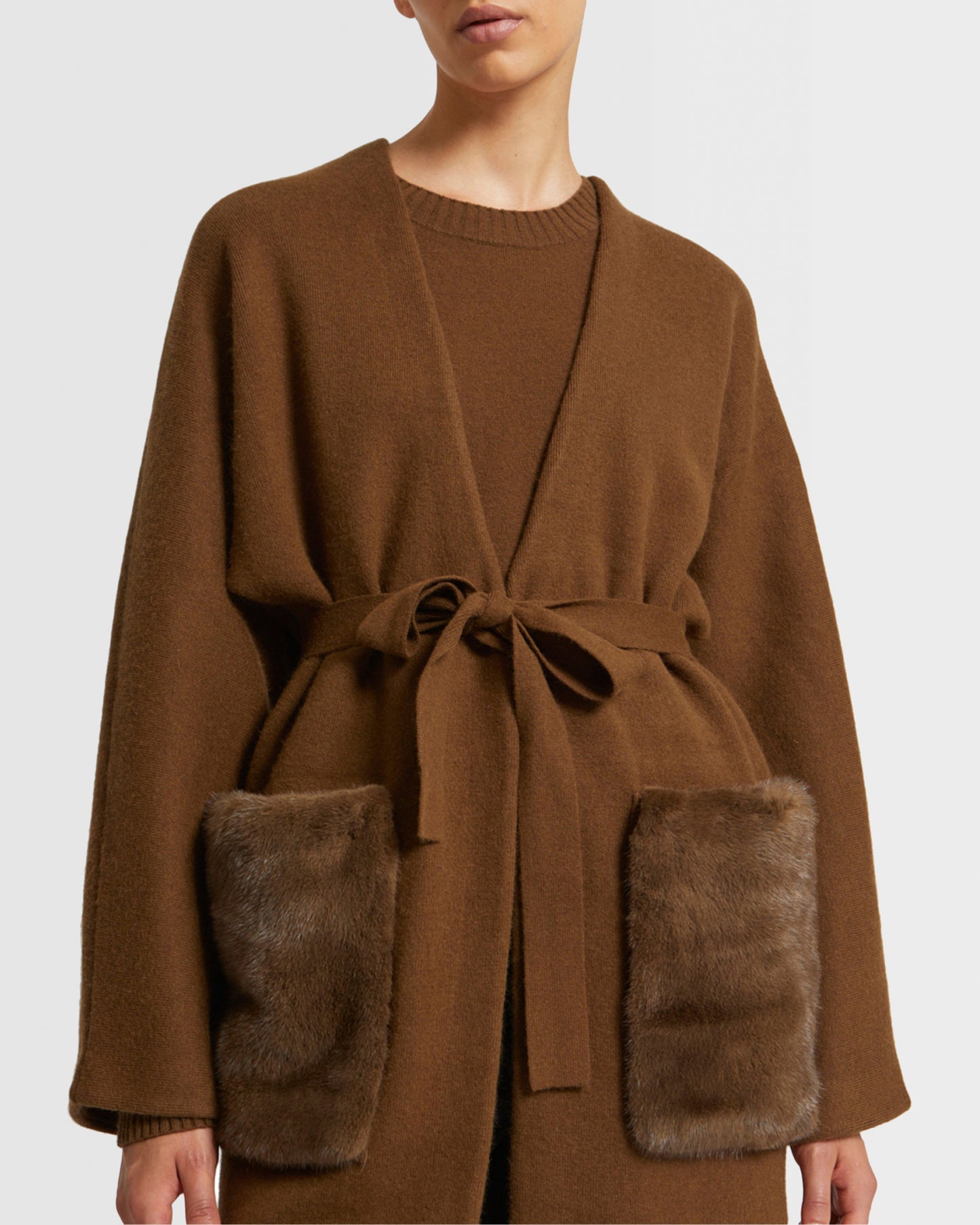 Long knit cardigan with mink fur over-pockets