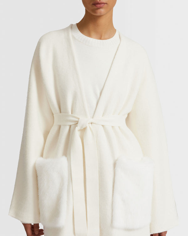 Long knit cardigan with mink fur over-pockets