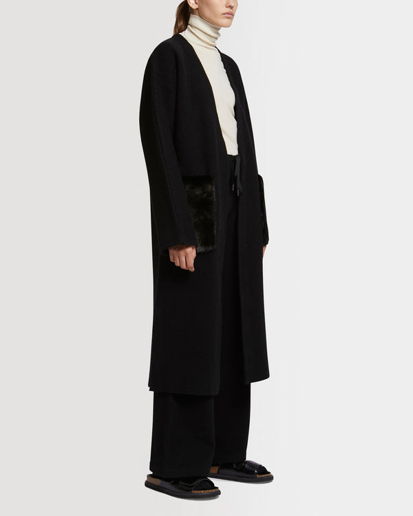 Long knit cardigan with mink fur over-pockets