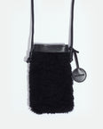 Phone case in curly merino and leather