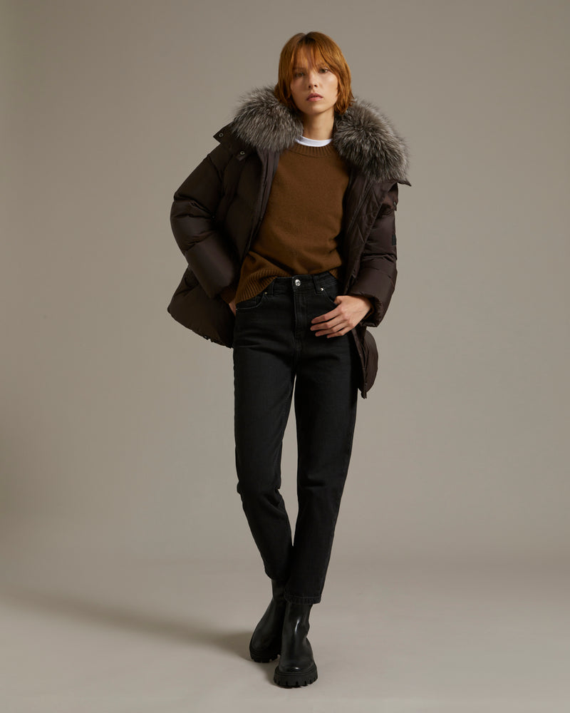 A line down jacket in water-repellent technical fabric with fox fur collar