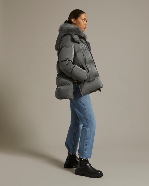 A line down jacket in icy water-repellent technical fabric with collar trim in fluffy lambswool