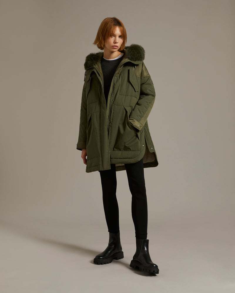 Long parka in a mix of technical fabrics with fox fur hood trim
