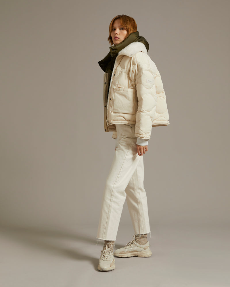 Down jacket in water-repellent technical fabric with short-haired lambskin collar trim