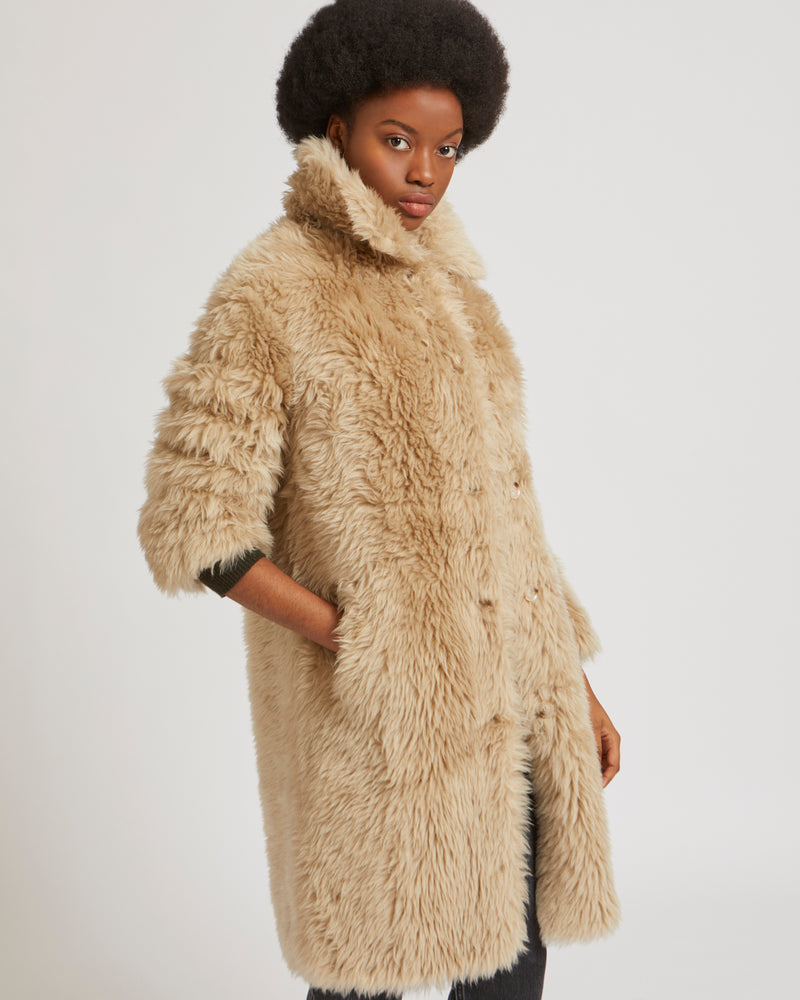 Long coat in natural long-haired woven wool