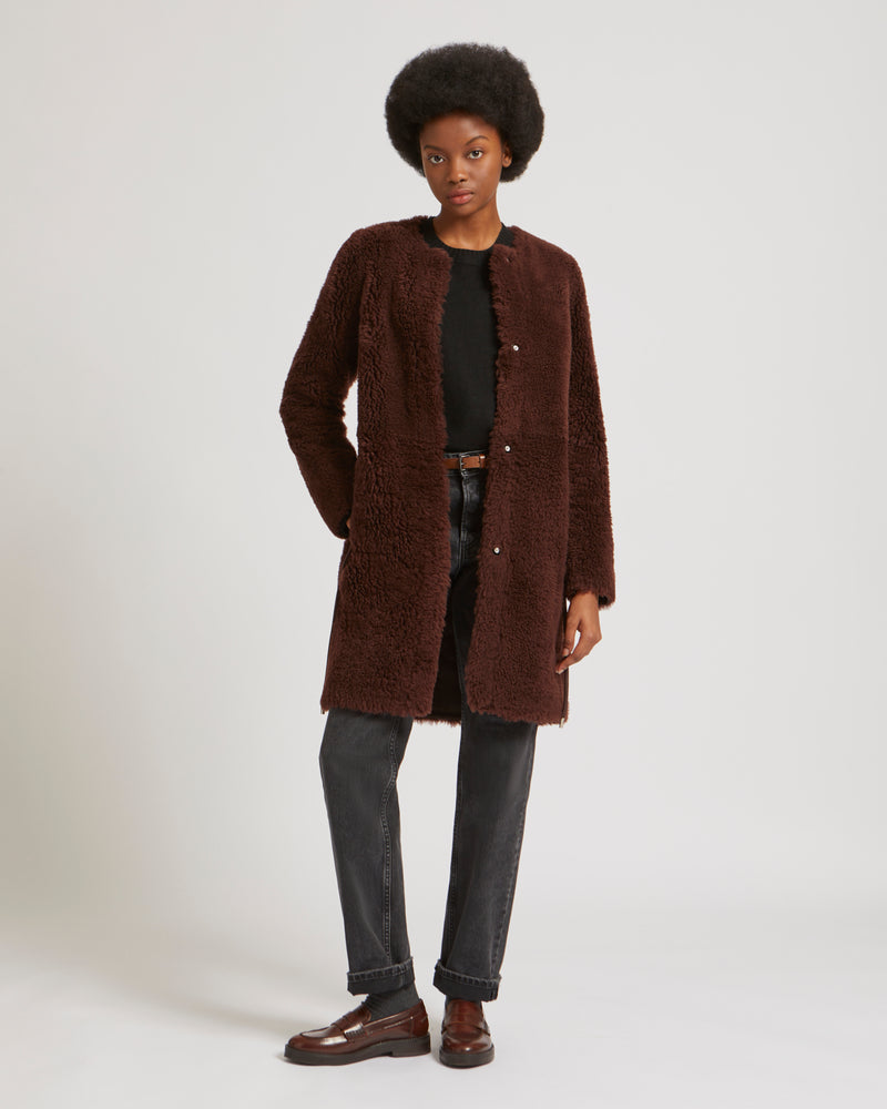 Collarless belted coat in long-haired merinillo
