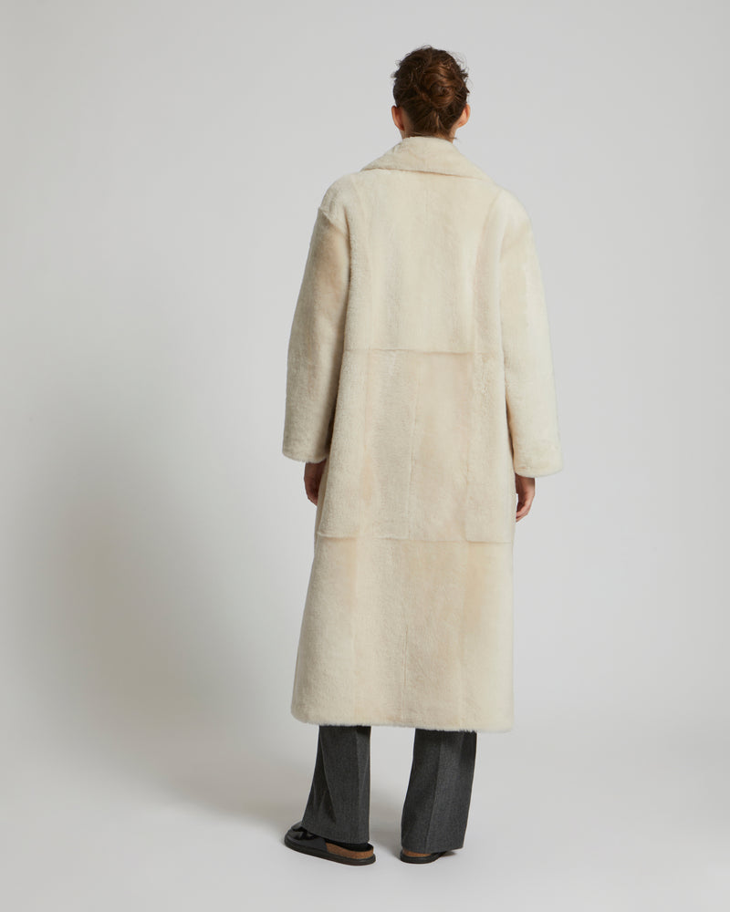 Long double-breasted shearling coat