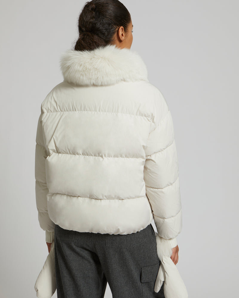 Boxy down jacket in waterproof technical fabric with fox fur collar