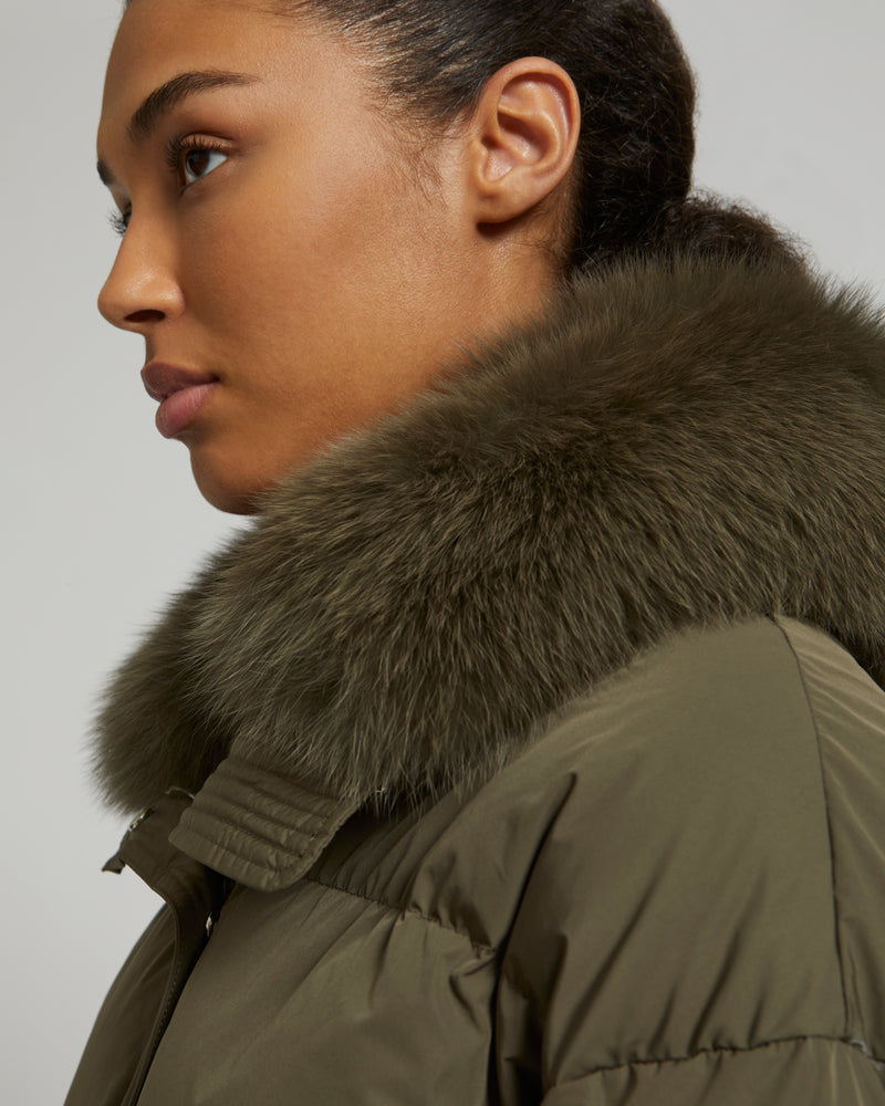 Boxy down jacket in waterproof technical fabric with fox fur collar