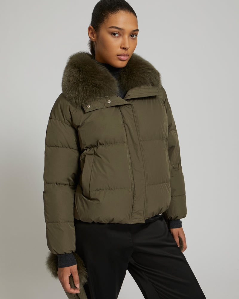 Boxy down jacket in waterproof technical fabric with fox fur collar