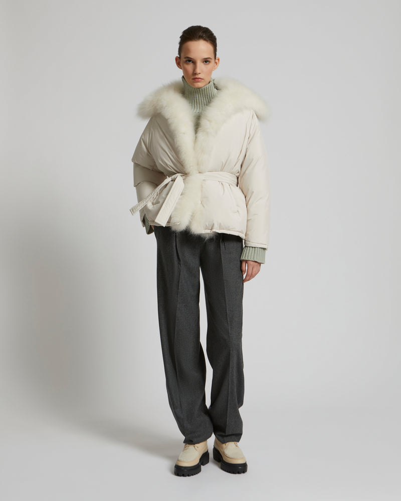 Oversized down jacket in waterproof technical fabric and long-haired lambskin