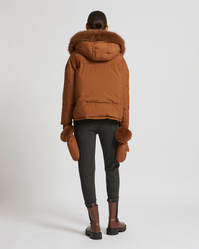 Boxy down jacket in waterproof technical fabric with fox hood trim