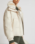 Short down jacket in waterproof flannel fabric with chinchilla fur