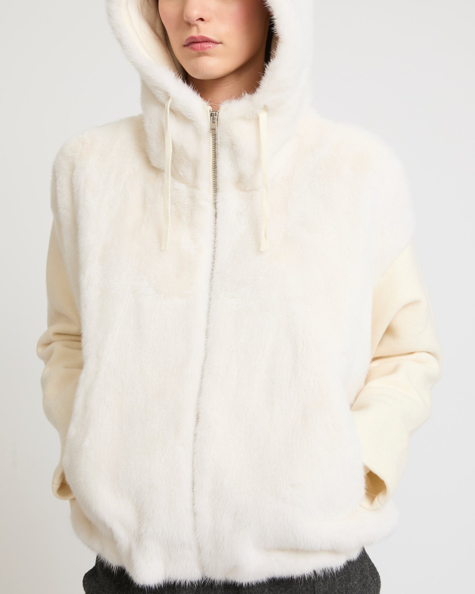Belted down jacket in waterproof technical fabric with fox and