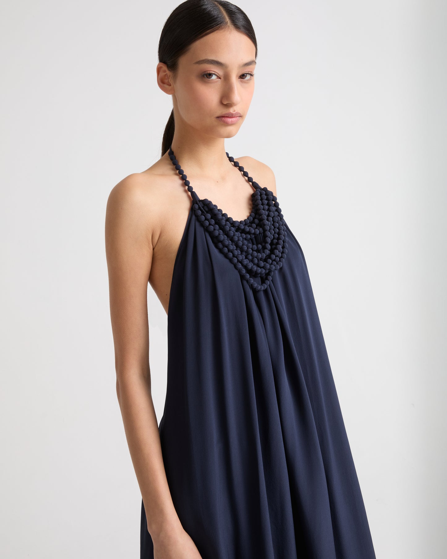 Necklace draped dress in light silk crepe