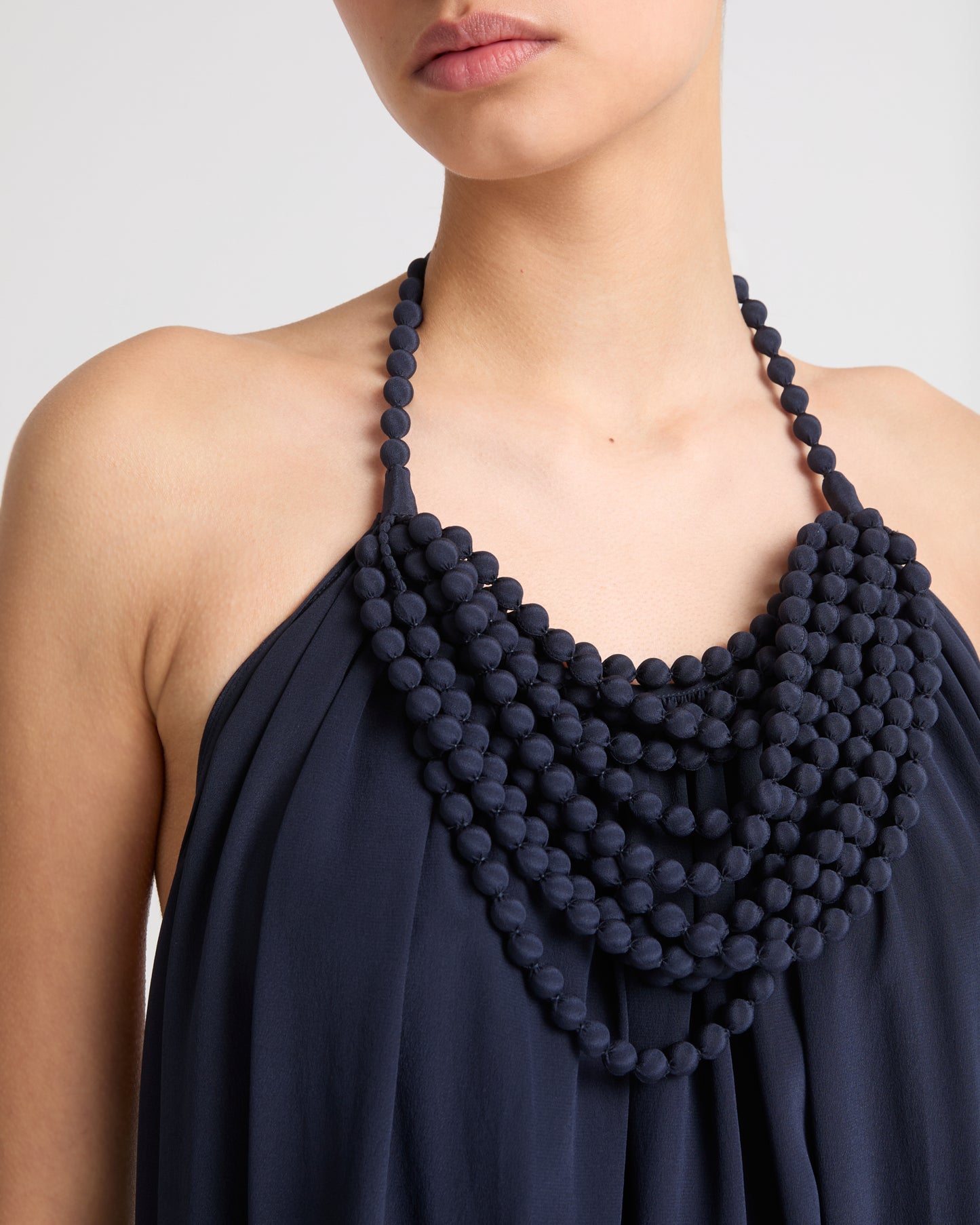 Necklace draped dress in light silk crepe