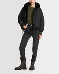 Short hooded down jacket in technical fabric reversible ribbed rex rabbit fur