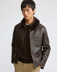 Leather jacket with shearling collar