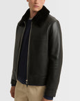 Leather jacket with shearling collar