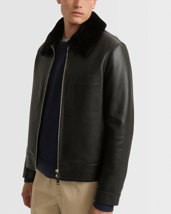 Leather jacket with shearling collar