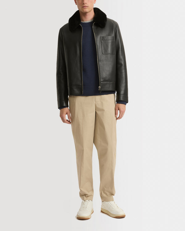 Leather jacket with shearling collar