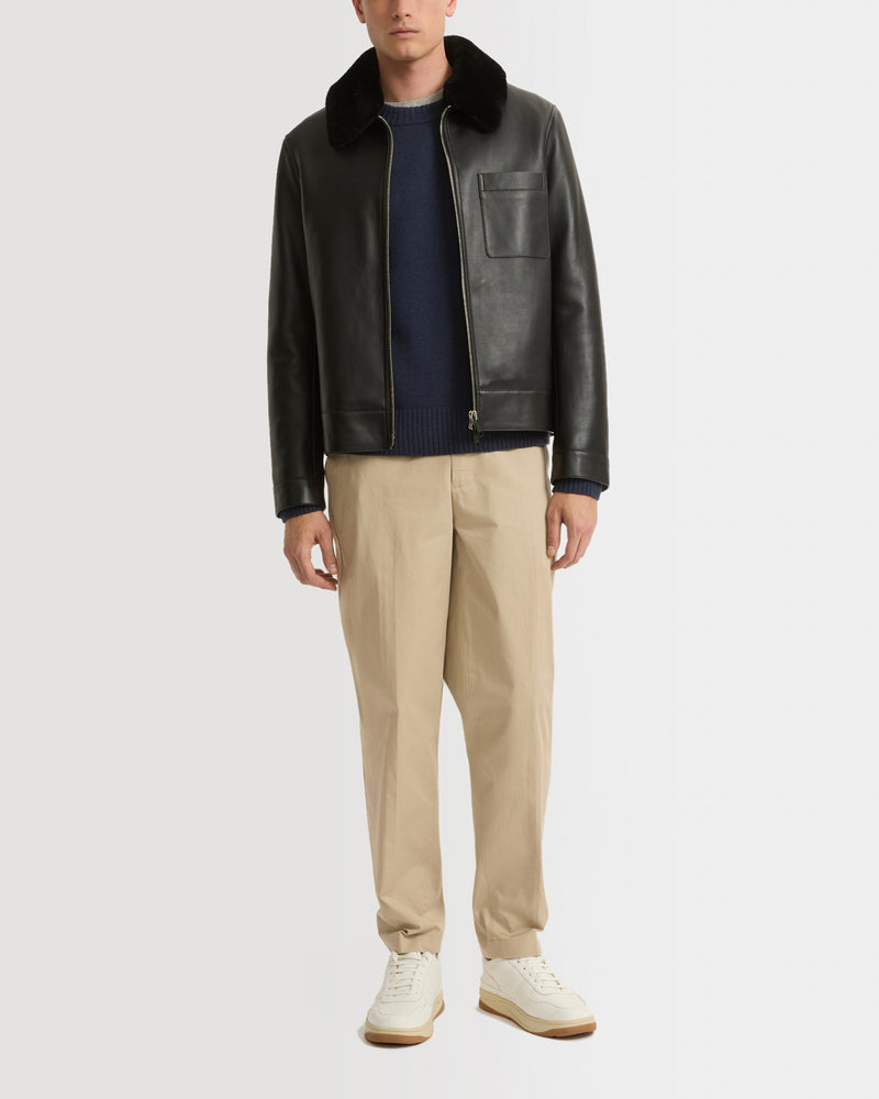 Leather jacket with shearling collar