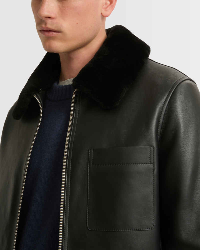 Leather jacket with shearling collar