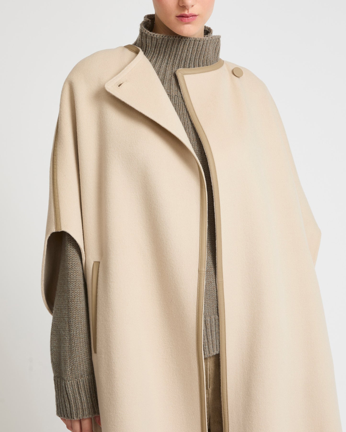 Double-sided cashmere blend cape with button details