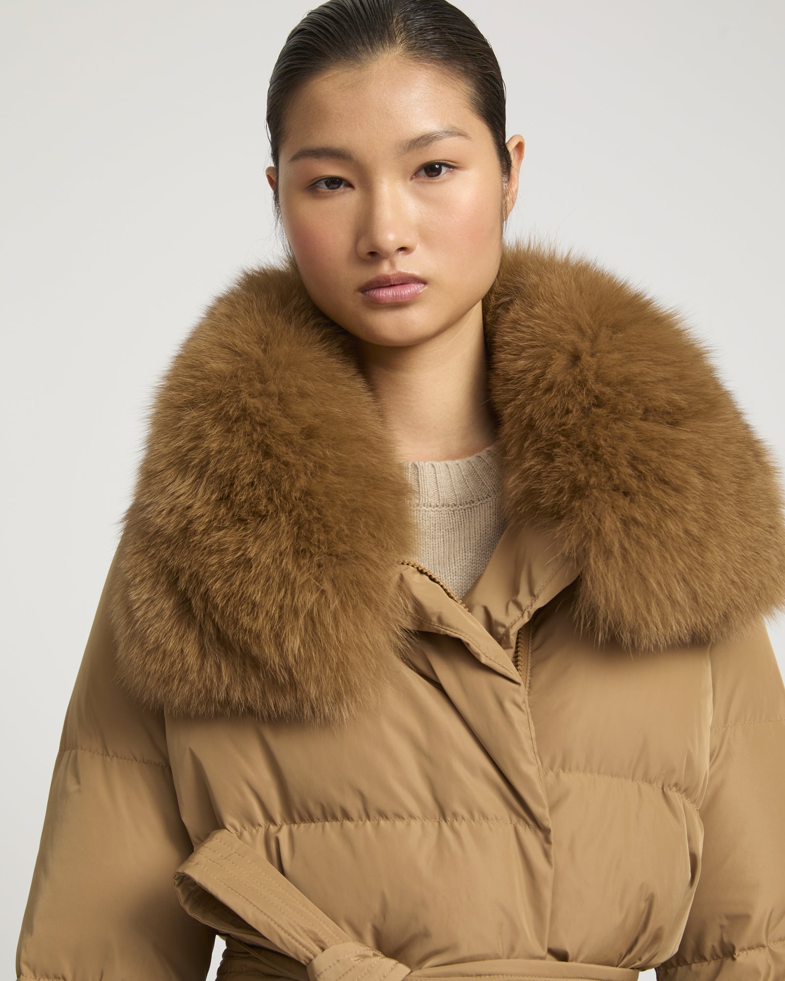 Long belted down jacket in technical fabric with detachable fox fur collar -Yves Salomon