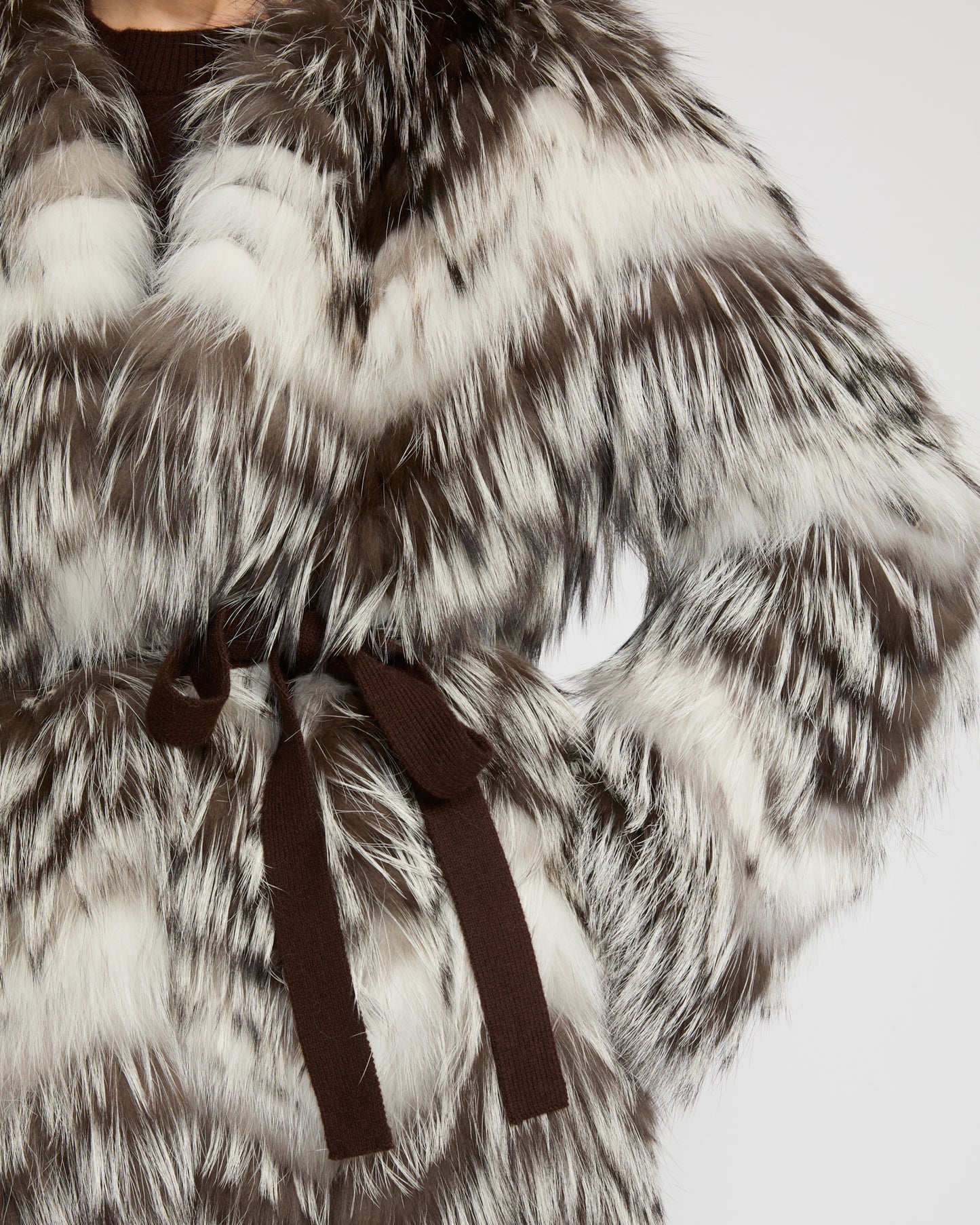 Belted coat in merino knit and fox fur