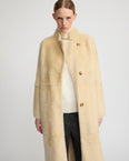 Straight belted shearling coat