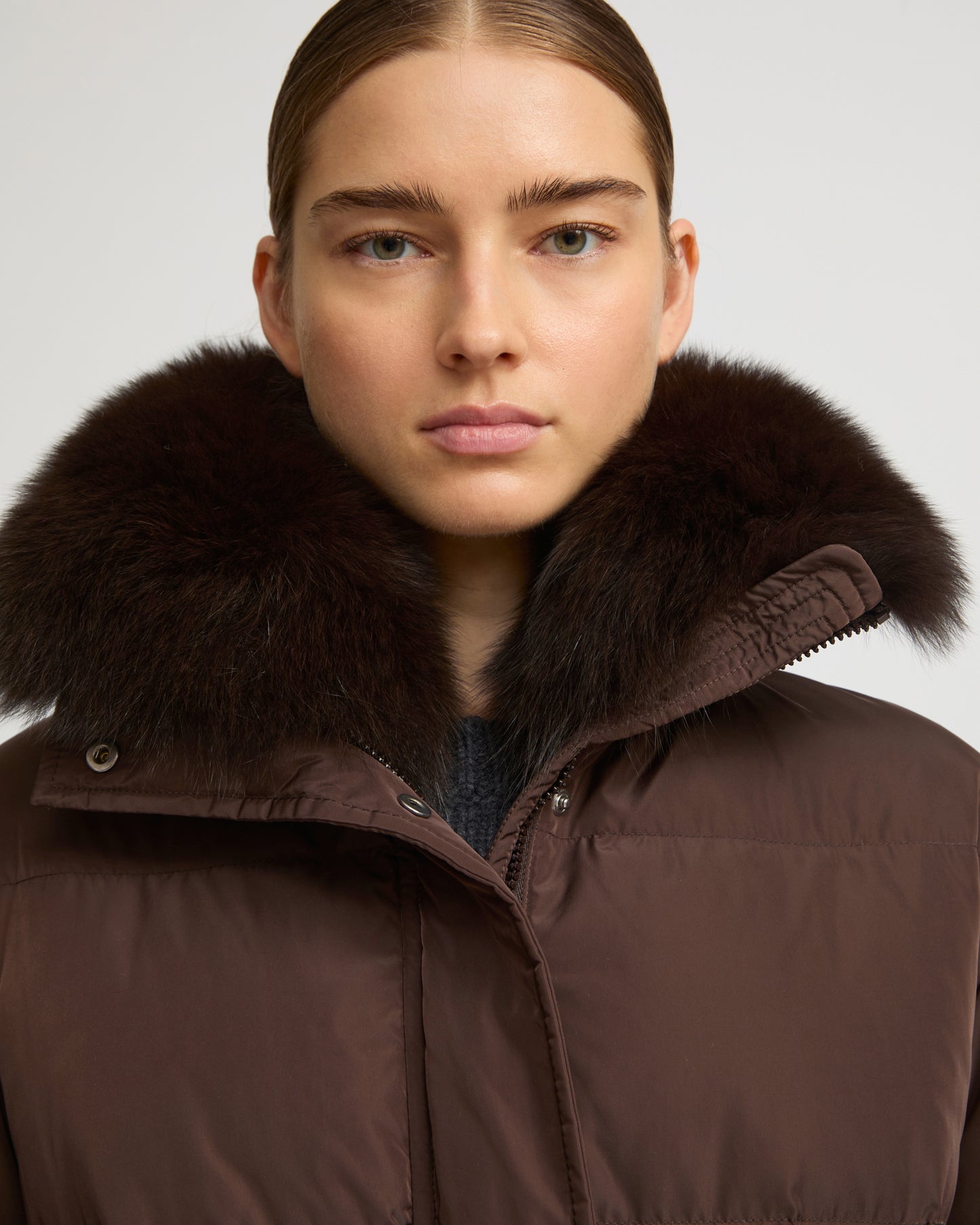 Belted technical fabric down jacket with detachable fox fur collar