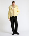 Short down jacket in waterproof technical fabric with airy lambswool trim