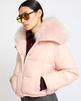 Short down jacket in waterproof technical fabric with airy lambswool trim