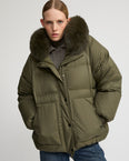 Short down jacket with raglan sleeves and fox fur trim