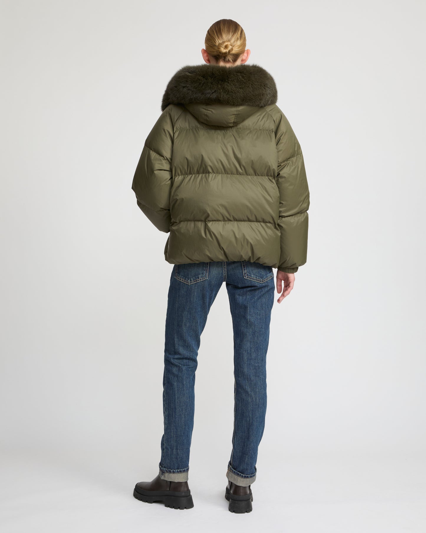 Short down jacket with raglan sleeves and fox fur trim