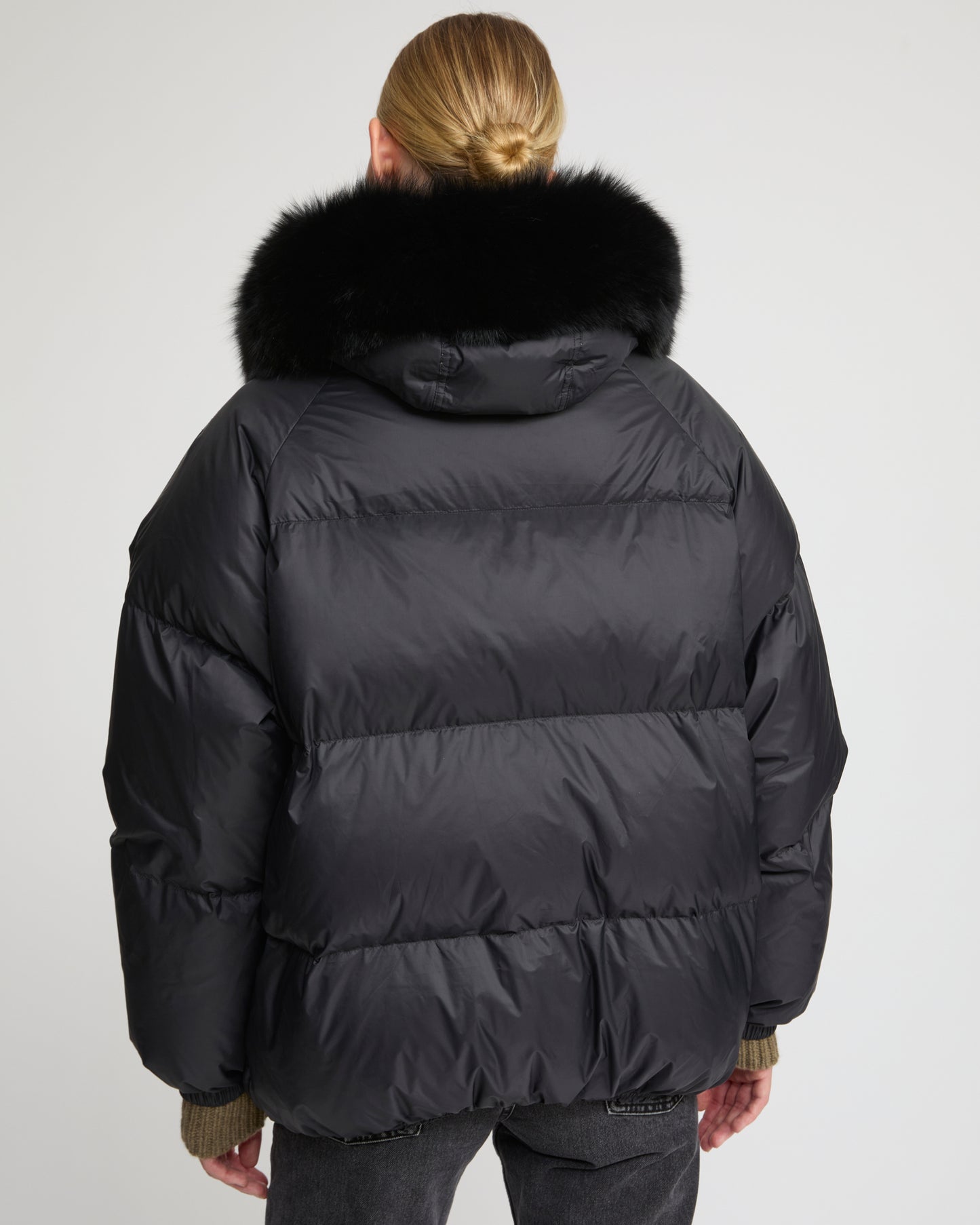 Short down jacket with raglan sleeves and fox fur trim