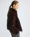 Reversible water-repellent technical fabric jacket with mink fur
