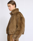 Reversible water-repellent technical fabric jacket with mink fur