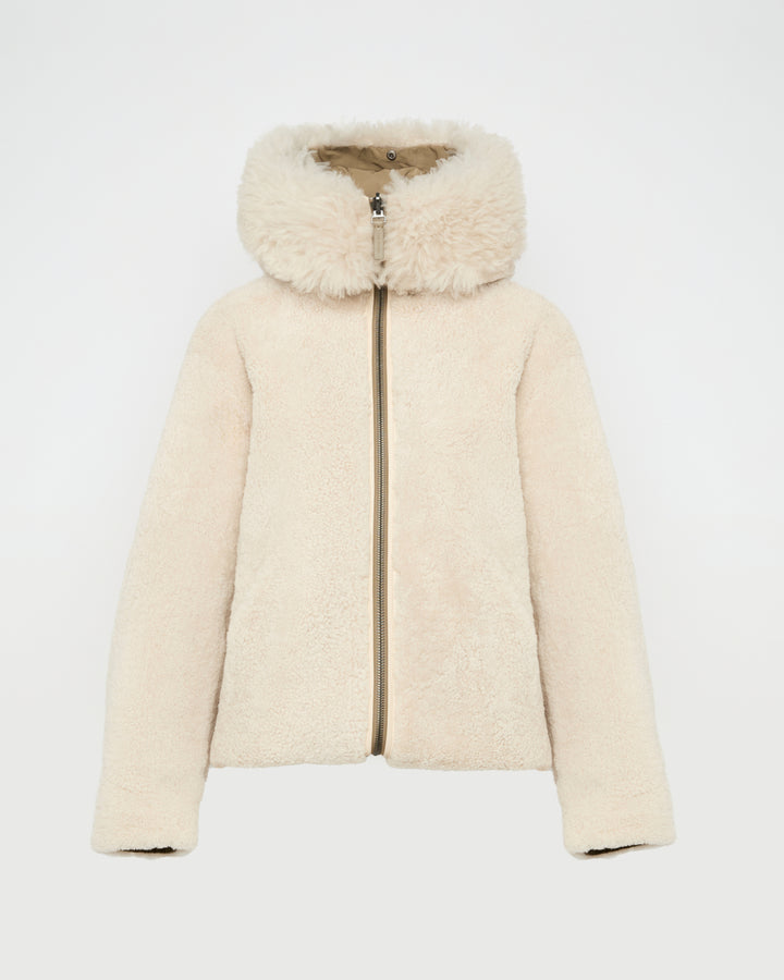 Reversible hooded parka in lambskin shearling and technical fabric